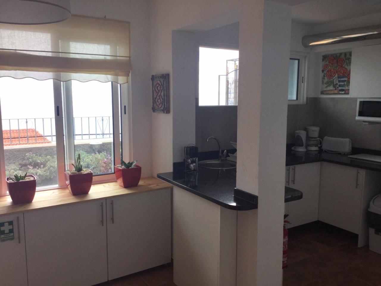 Banda Do Sol Self Catering Cottages Estreito Da Calheta Exteriör bild